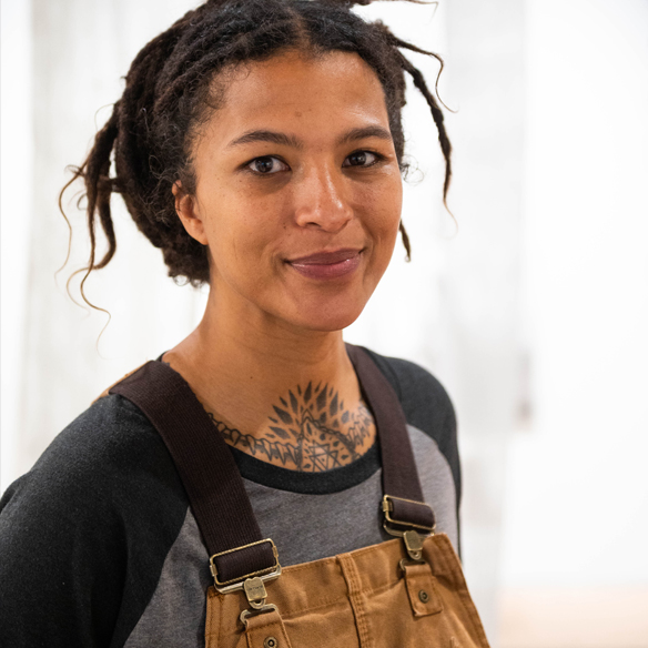 Nikesha Breeze, along with NMSU Art Museum staff set up her art work, Four Sites of Return: Ritual, Remembrance, Reparation & Reclamation