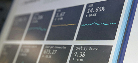 Data analytics shown on the screen of a laptop.