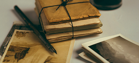A stack of historical letters. 