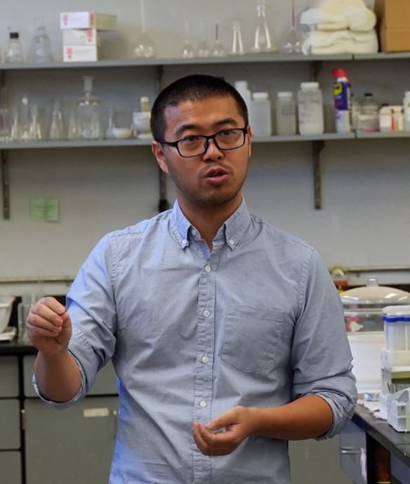 Researcher in lab giving a lecture