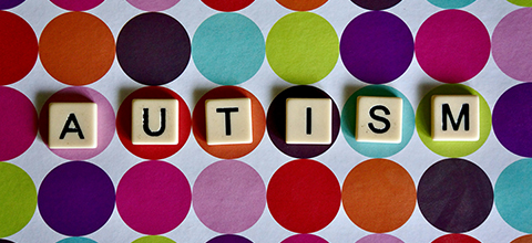 Tiles that spell the word "autism" 