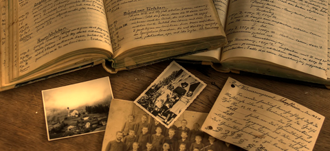 A collection of old documents and photographs