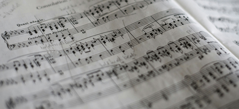 A closeup of a fountain pen and writing