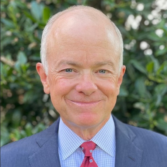 David Hill wearing professional clothing. 