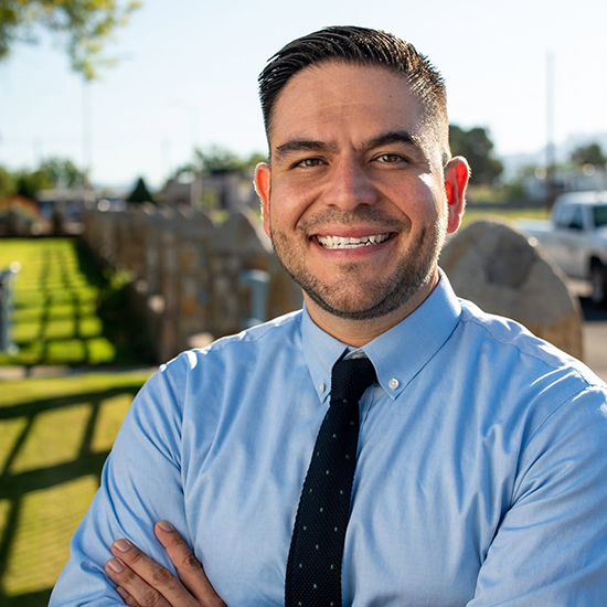 Gabe Vasquez wearing professional wear.