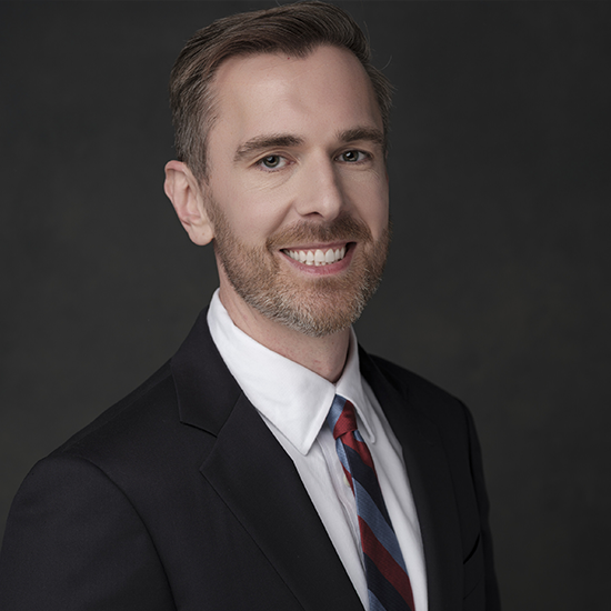Gregory Allen wearing professional clothing.