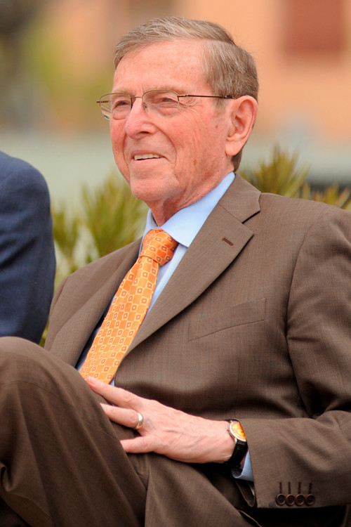 Pete Domenici seated at an event.